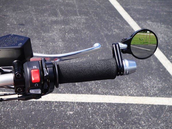 Black folding bar end mirrors on a Vmax